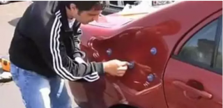 汽车凹陷修复吸盘工具，看看外国小伙是如何使用的？